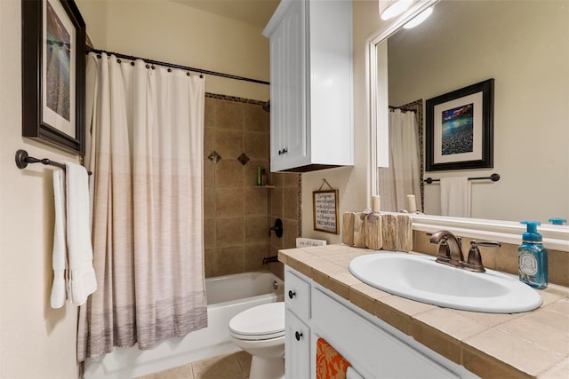 full bathroom featuring shower / bath combo, tile patterned flooring, vanity, and toilet