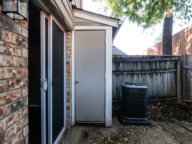 entrance to property with central AC unit