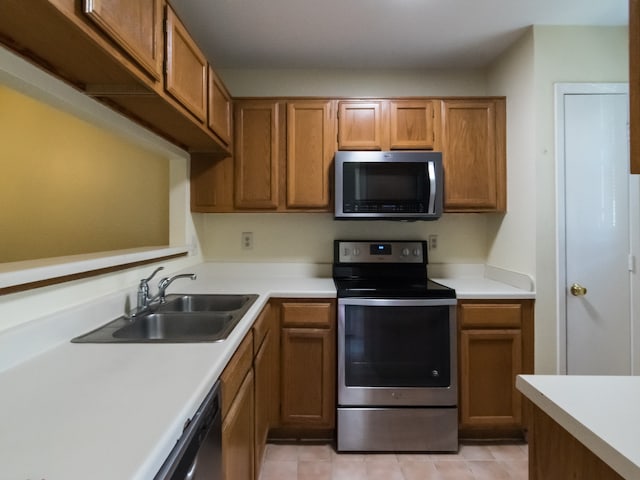 kitchen featuring appliances with stainless steel finishes and sink