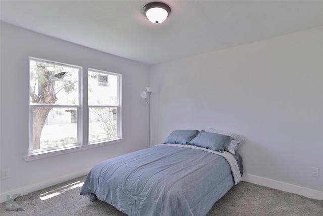 bedroom featuring carpet flooring