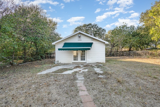 view of outdoor structure with french doors