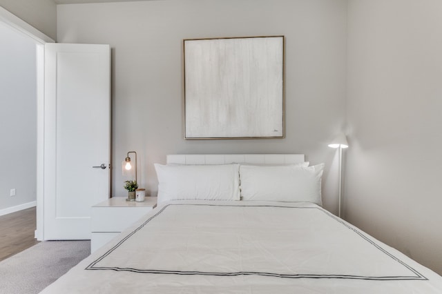 bedroom featuring wood-type flooring