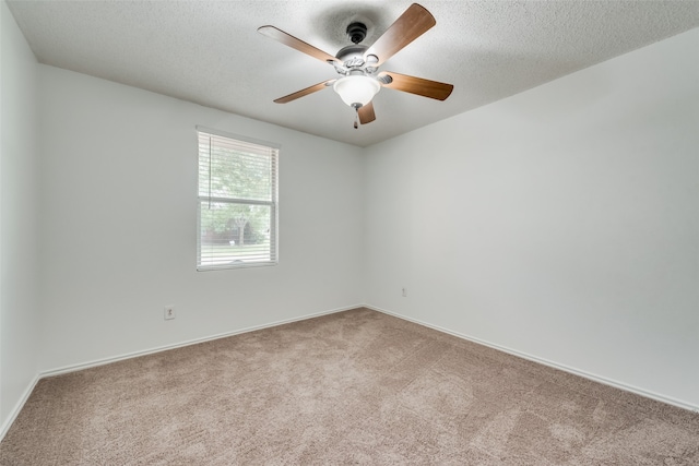 unfurnished room with carpet, a textured ceiling, and ceiling fan