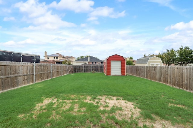 view of yard featuring a storage unit