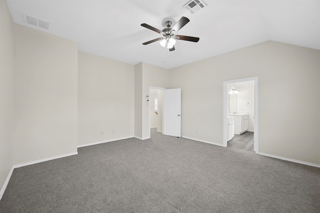 unfurnished bedroom with ceiling fan, connected bathroom, lofted ceiling, and carpet floors