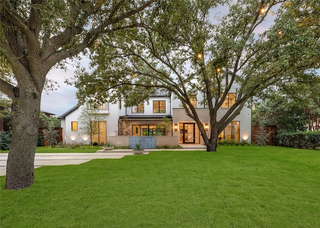 view of front of home with a front yard