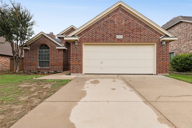 front of property featuring a garage