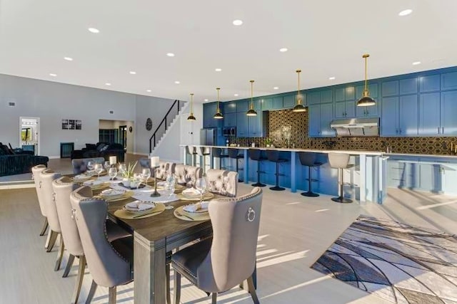 dining room with light hardwood / wood-style flooring