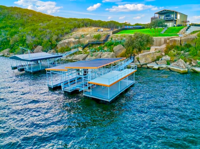 dock area featuring a water view