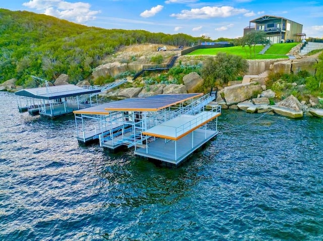 dock area with a water view