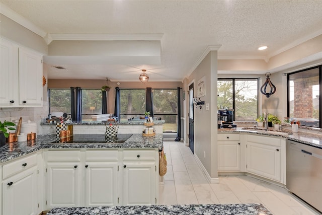 kitchen featuring backsplash, white cabinets, ornamental molding, stainless steel dishwasher, and black electric cooktop