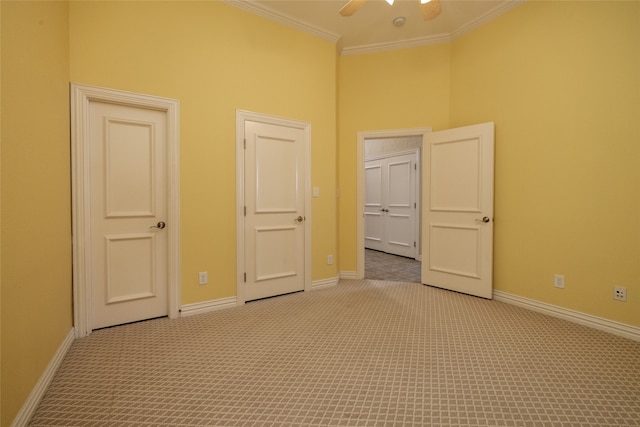 unfurnished bedroom with ceiling fan, light carpet, and ornamental molding