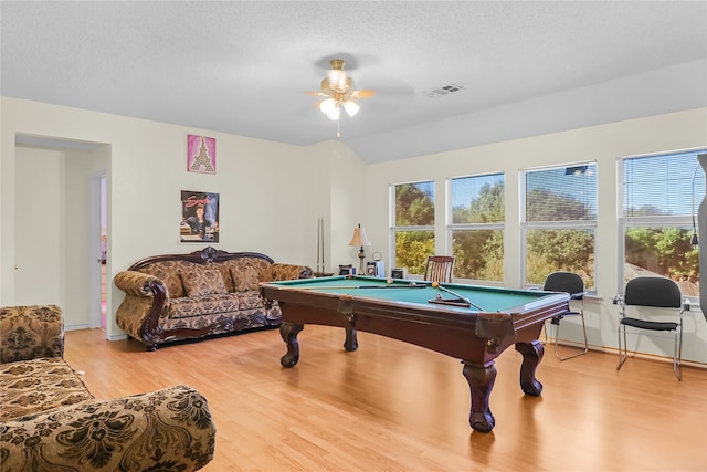 recreation room featuring pool table, a textured ceiling, ceiling fan, and light hardwood / wood-style flooring