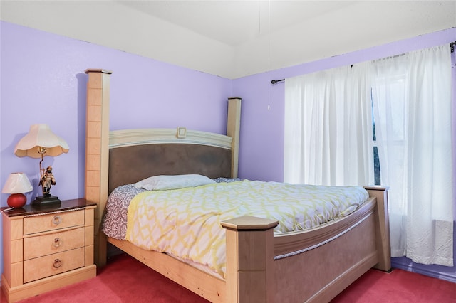 bedroom with dark carpet