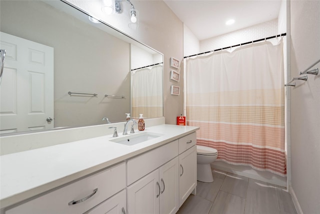 full bathroom featuring vanity, shower / bath combo, and toilet