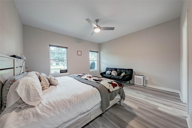 bedroom featuring ceiling fan and light wood-type flooring