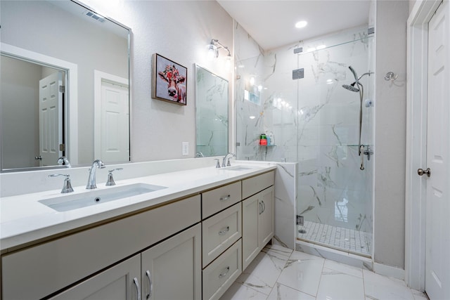 bathroom with walk in shower and vanity