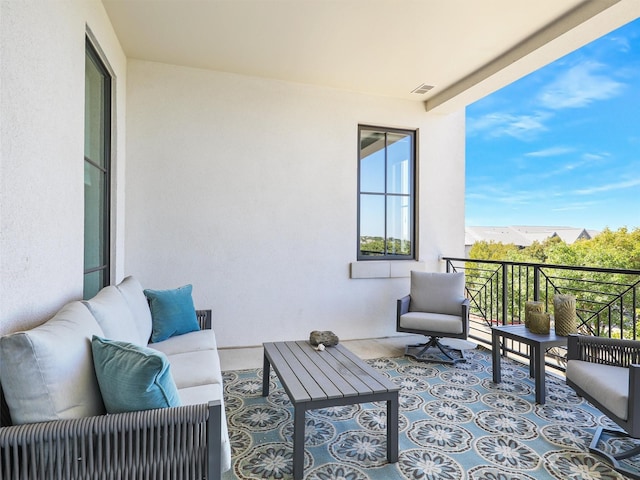 balcony featuring outdoor lounge area