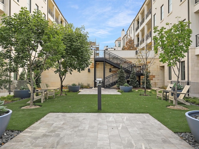 5270 Town And Country Blvd Unit 205, Frisco, TX 75034 - view of property's community featuring a patio and stairs