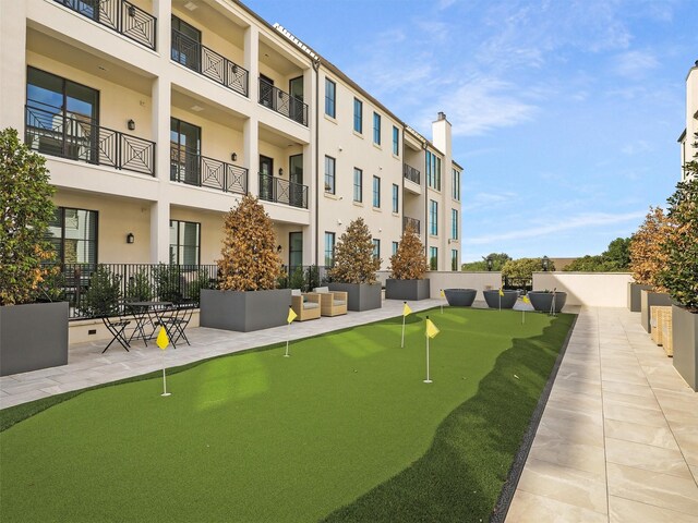 5270 Town And Country Blvd Unit 205, Frisco, TX 75034 - view of property's community with a putting green