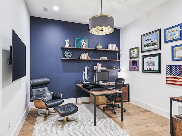 office area with light wood-type flooring