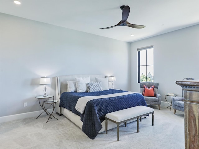 carpeted bedroom featuring ceiling fan