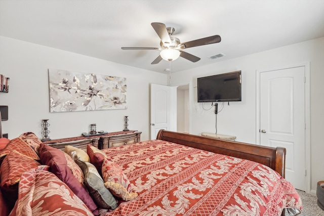 carpeted bedroom featuring ceiling fan