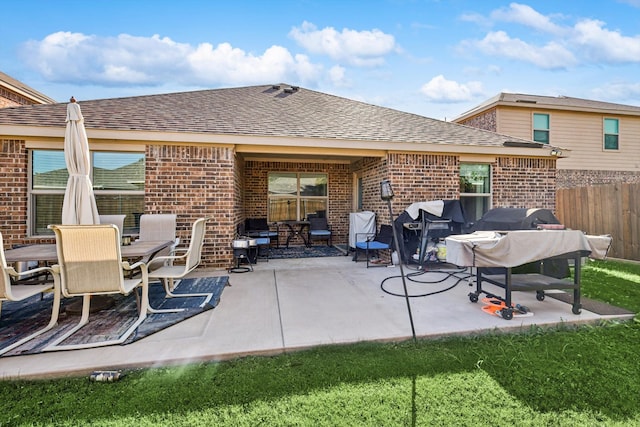 rear view of house featuring a patio