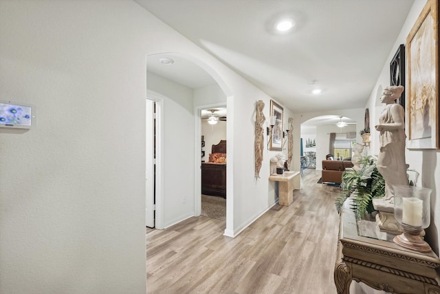 corridor featuring light hardwood / wood-style floors