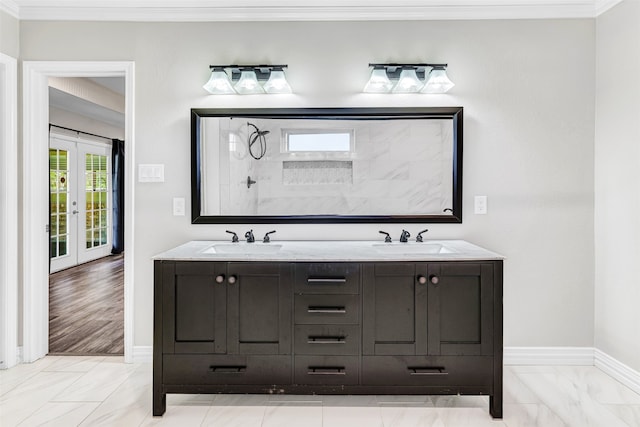 bathroom featuring hardwood / wood-style floors, walk in shower, vanity, and ornamental molding