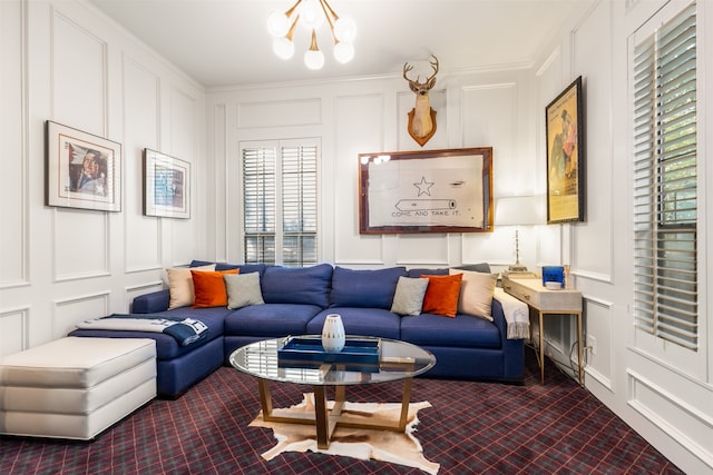 living room with an inviting chandelier