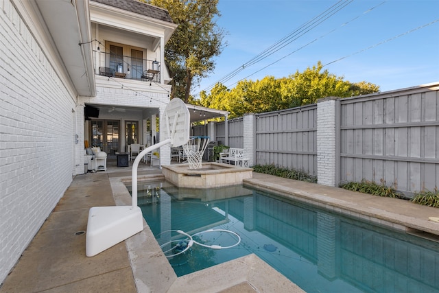 view of pool with a patio area