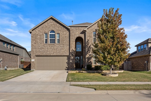 view of front property with cooling unit, a garage, and a front lawn