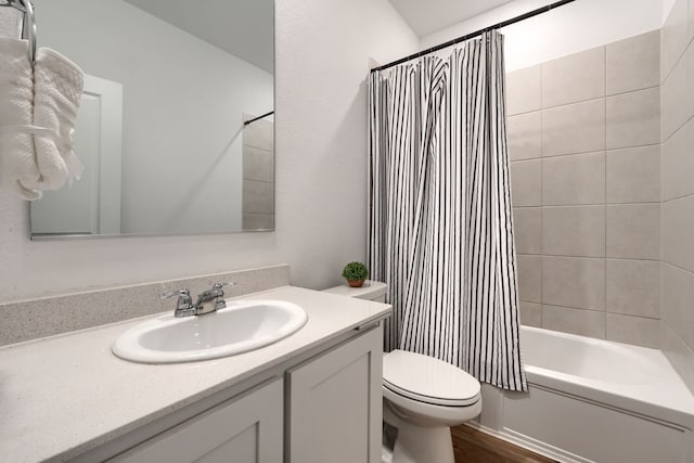 full bathroom with shower / bath combo, vanity, toilet, and wood-type flooring