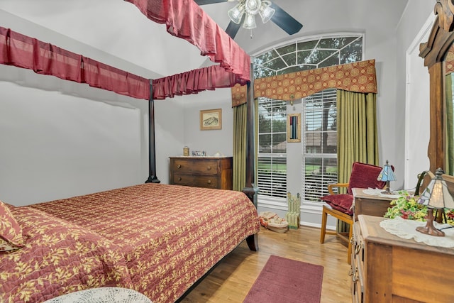 bedroom with ceiling fan and light wood-type flooring