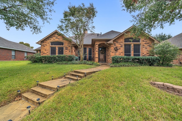 view of front of home with a front yard