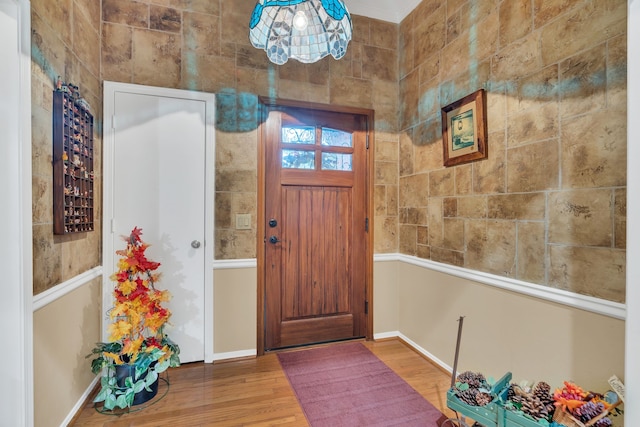 entrance foyer featuring hardwood / wood-style floors