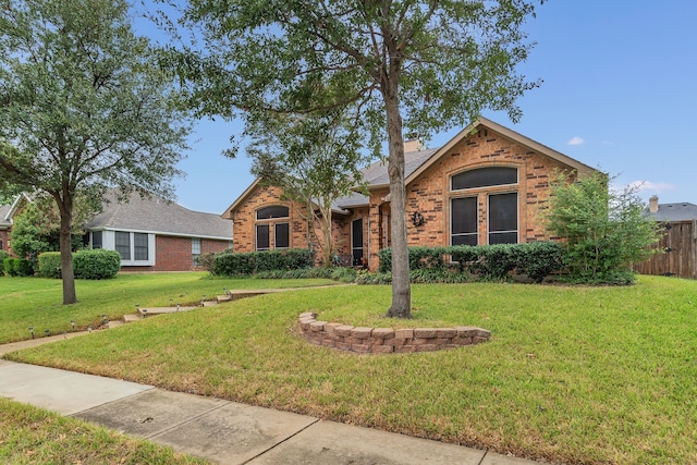 view of front facade with a front yard