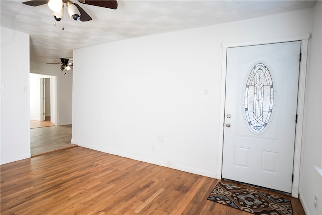 entryway featuring hardwood / wood-style flooring and ceiling fan