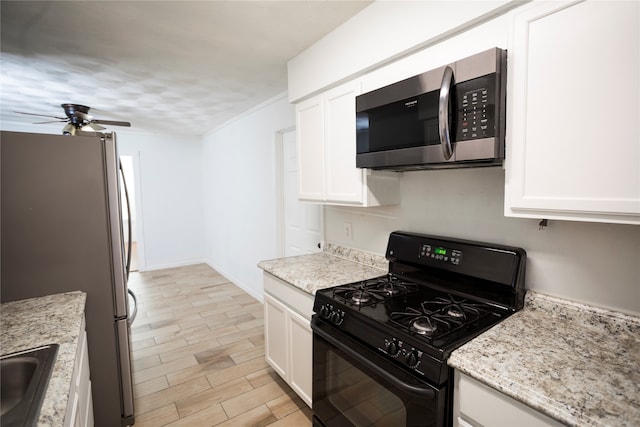 kitchen featuring stainless steel appliances, white cabinetry, light stone countertops, light hardwood / wood-style floors, and ceiling fan