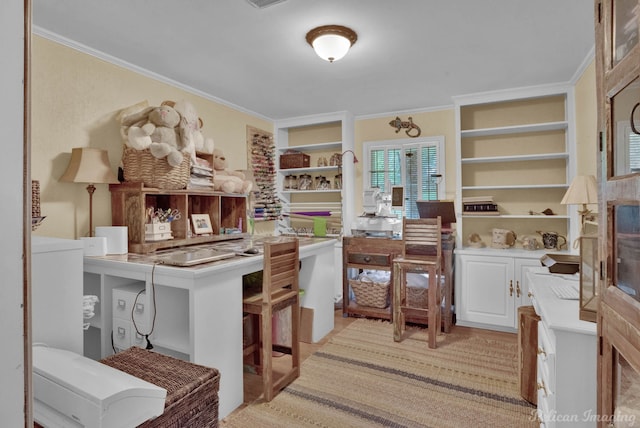 home office featuring crown molding