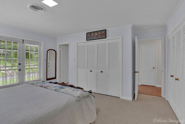 341 Corinne Cir, Shreveport, LA 71106 - bedroom with french doors, crown molding, light carpet, and access to outside