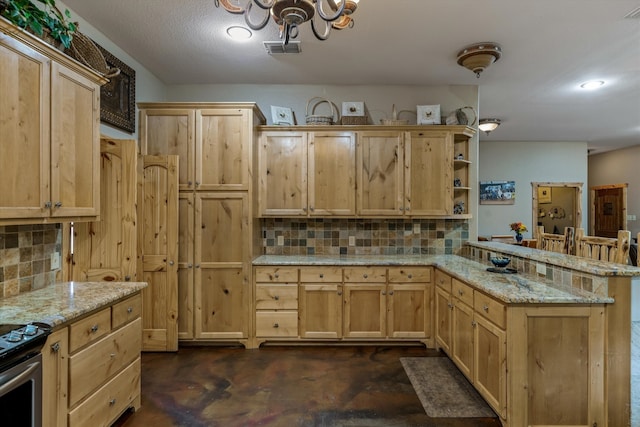 kitchen featuring light brown cabinets, kitchen peninsula, light stone counters, and tasteful backsplash