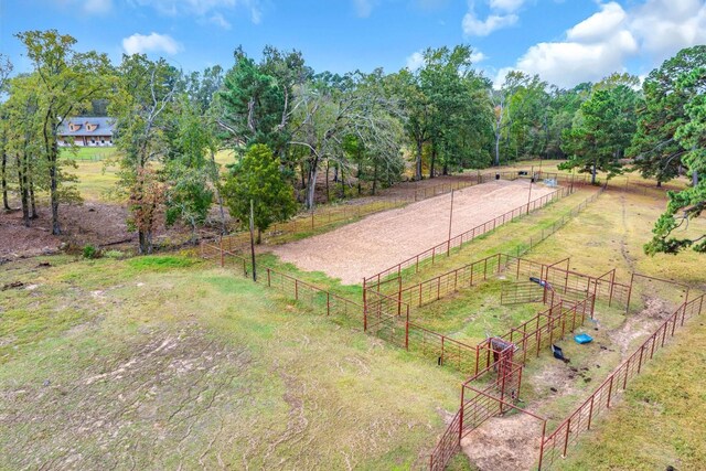 view of yard with a rural view