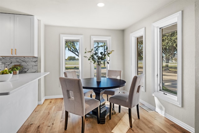 dining room with light wood-type flooring