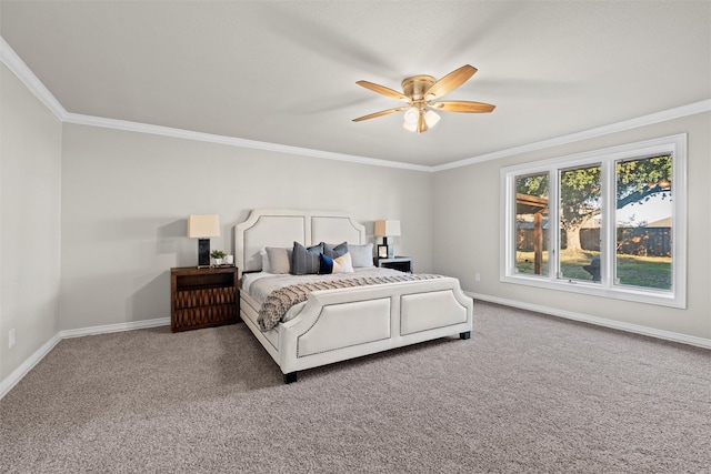 bedroom featuring carpet floors, ceiling fan, and ornamental molding