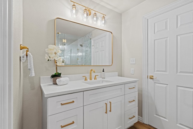 bathroom featuring vanity and walk in shower