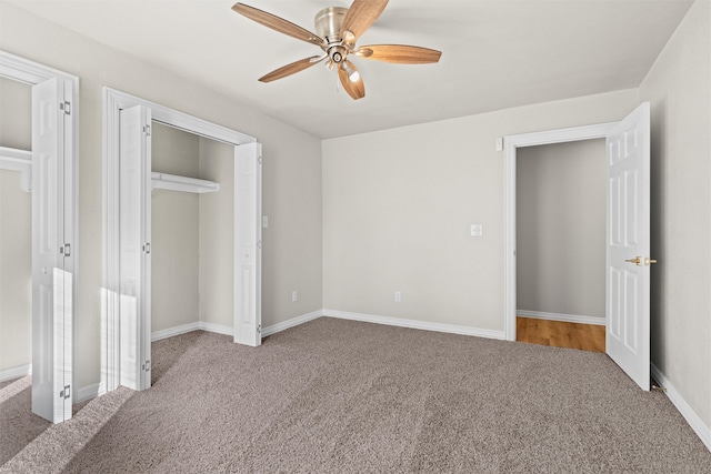 unfurnished bedroom with carpet, a closet, and ceiling fan