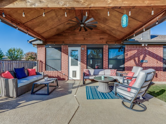 view of patio / terrace featuring ceiling fan and an outdoor living space