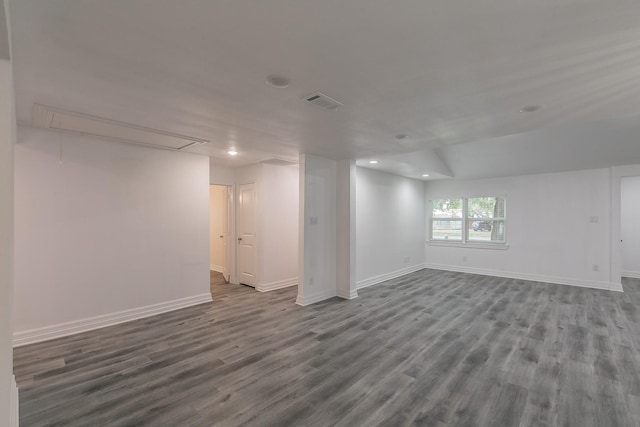 basement with hardwood / wood-style floors